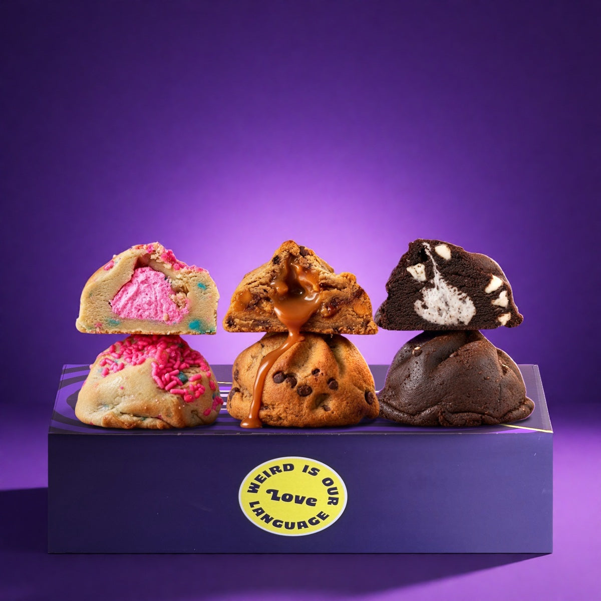 Build your own box: three stuffed cookies cut in half on a Fat & Weird box, Weird is our Love language sticker