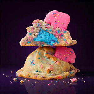 The Party Animal cookie by Fat & Weird Cookie with blue animal-cracker frosting core and colorful sprinkles on top