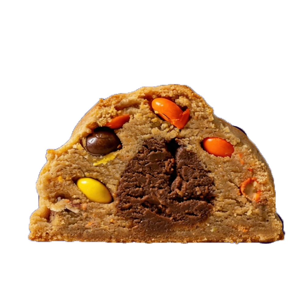 The Pudge cookie broken open to show the peanut butter and chocolate center