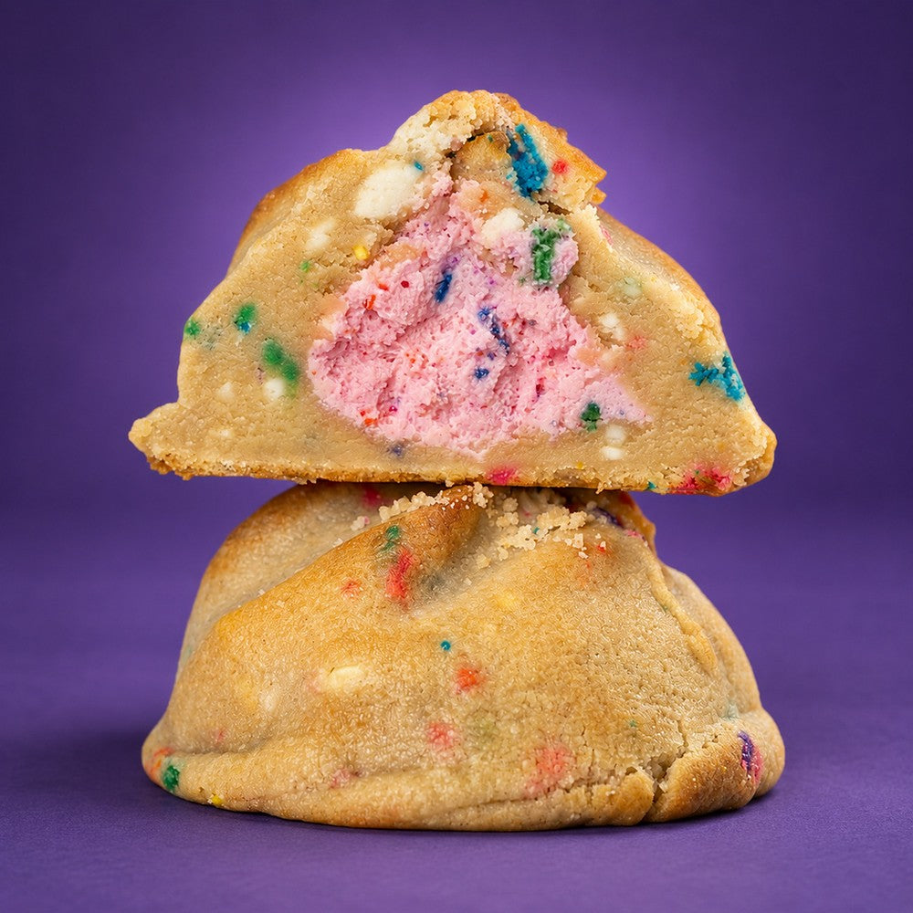 Caked Up cookie broken open to show the cake pop center