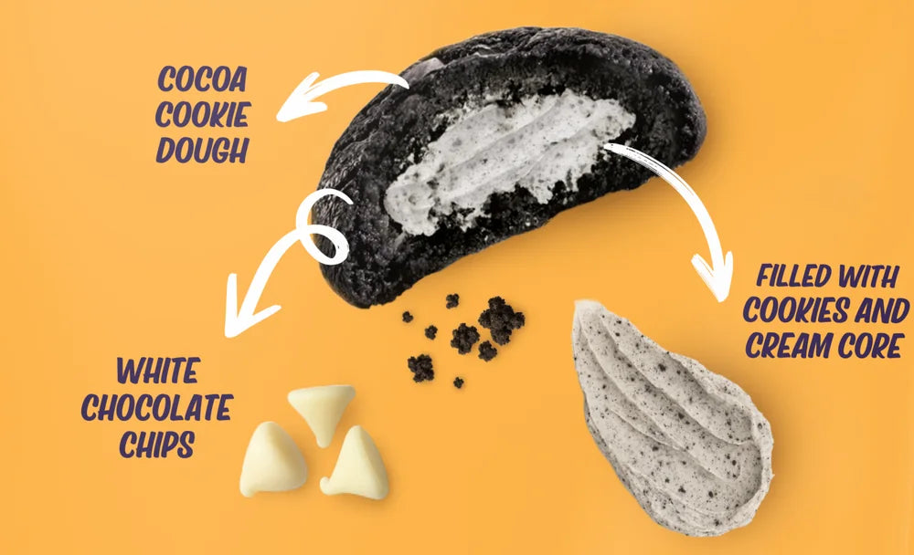 Black Beauty mini cookie cut open, showing the black cocoa dough and the cookies and cream frosting core