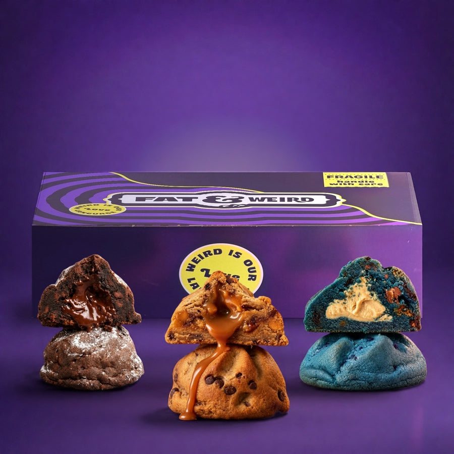 A Fat & Weird box with three stuffed cookies cut open in front